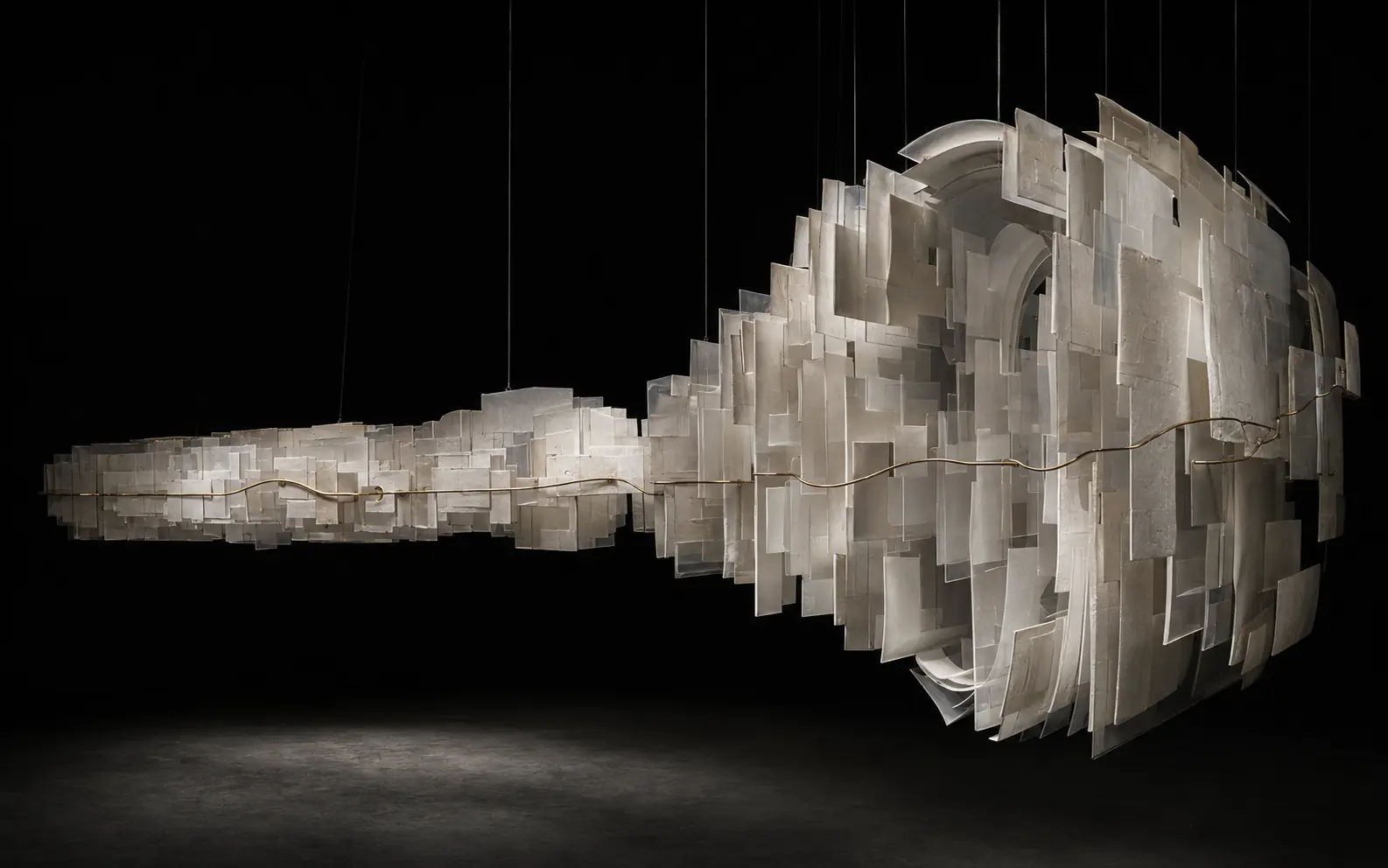 A suspended material study growing from compact translucent layers into a larger vaulted structure